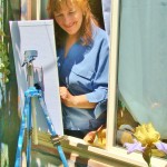 Lillian Kennedy painting plein air and in the studio simulaneously 